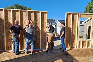 Wauseon Machine team members supporting their local community with home build project