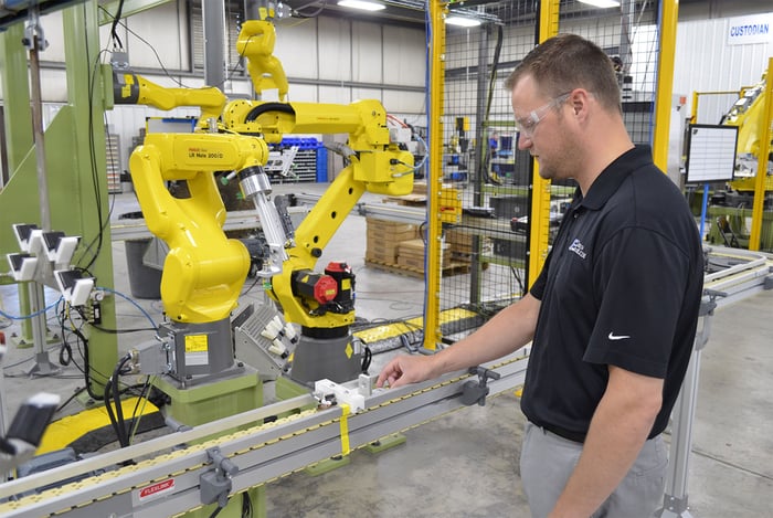Robotic automation equipment with Wauseon Machine team operating Robotic automation equipment with Wauseon Machine team operating
