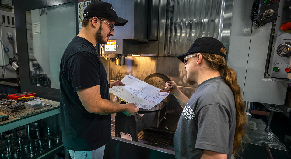 Two Wauseon experts in a manufacturing setting